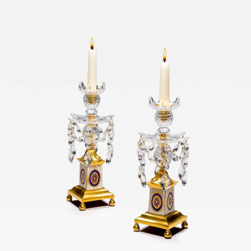 A PAIR OF GEORGE III ORMOLU MOUNTED PORCELAIN CUT GLASS CANDLESTICKS