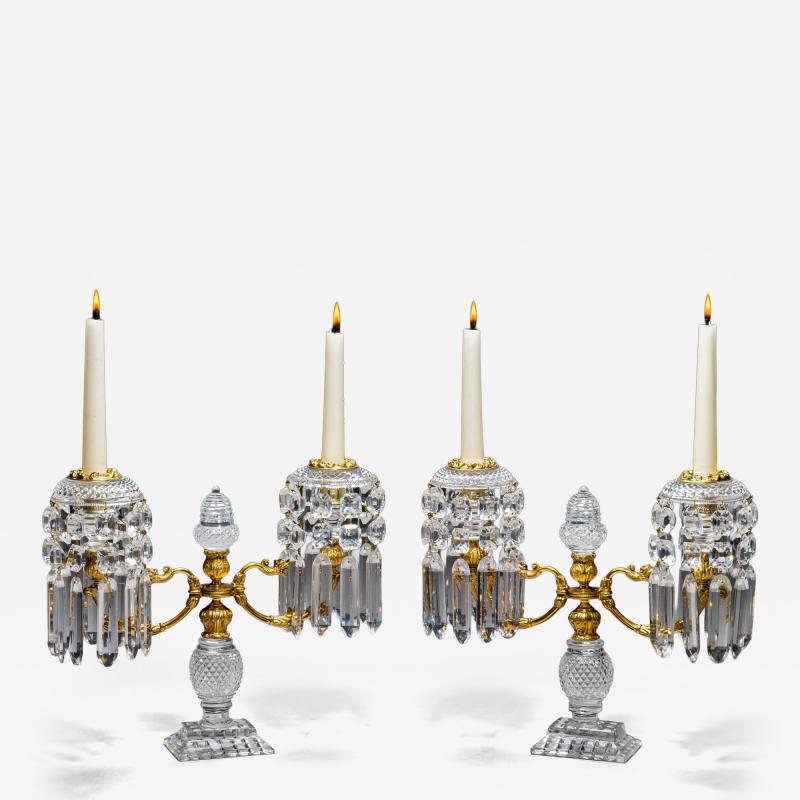 A PAIR OF ORNATE REGENCY CANDELABRA