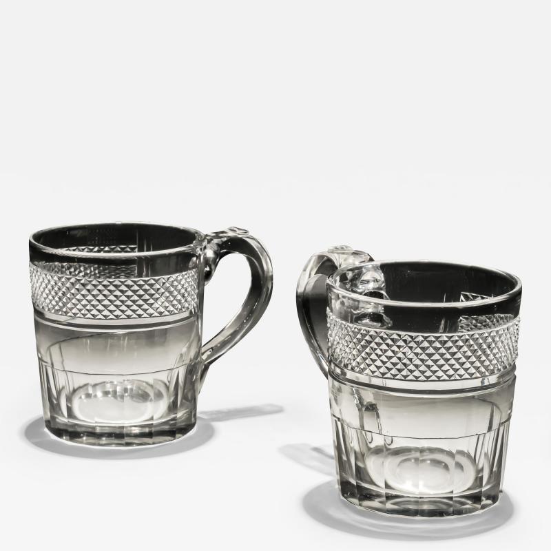 A PAIR OF REGENCY CUT MUGS