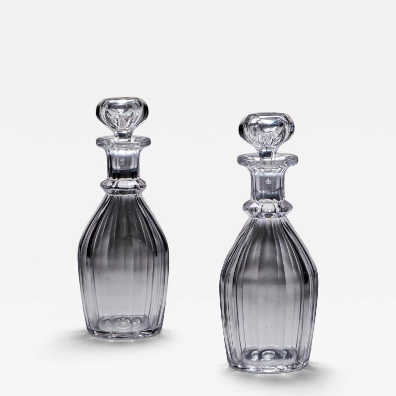 A PAIR OF SLICE CUT WILLIAM IV CLUB DECANTERS
