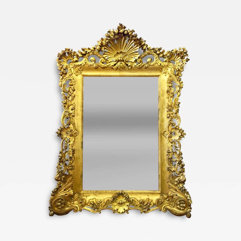 A PALATIAL LOUIS XV STYLE FRENCH CARVED RECTANGULAR GILT WOOD MIRROR
