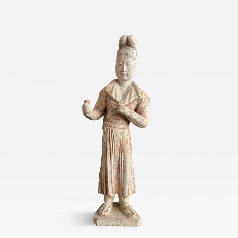 A Painted Pottery figure of male courtier 