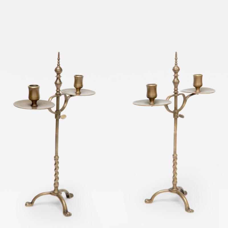 A Pair of Arts Crafts Brass Twin Branch Candelabras with Adjustable Height