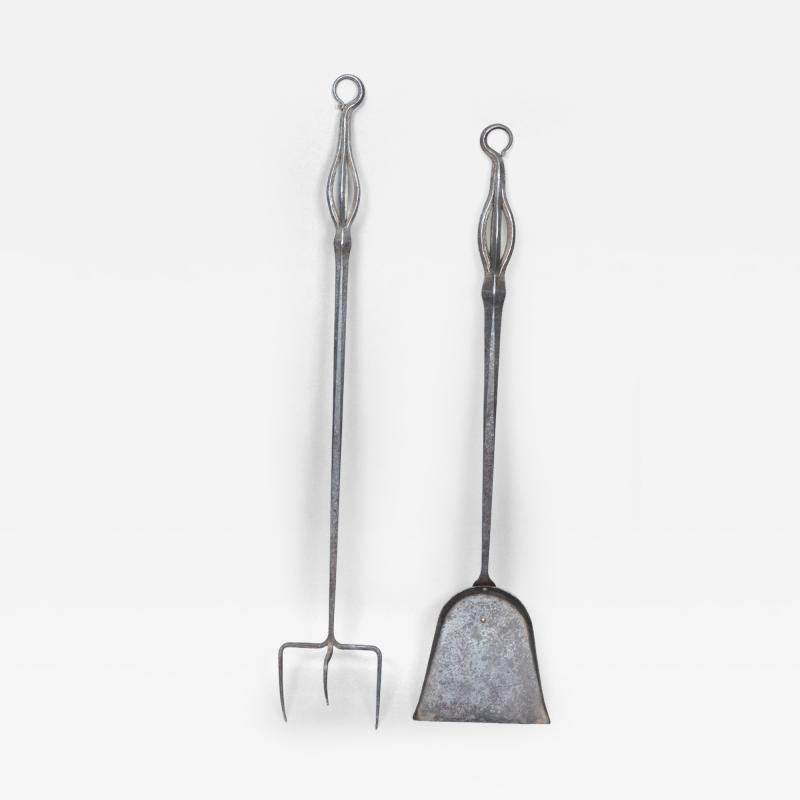 A Pair of Arts Crafts Steel Fire Utensils