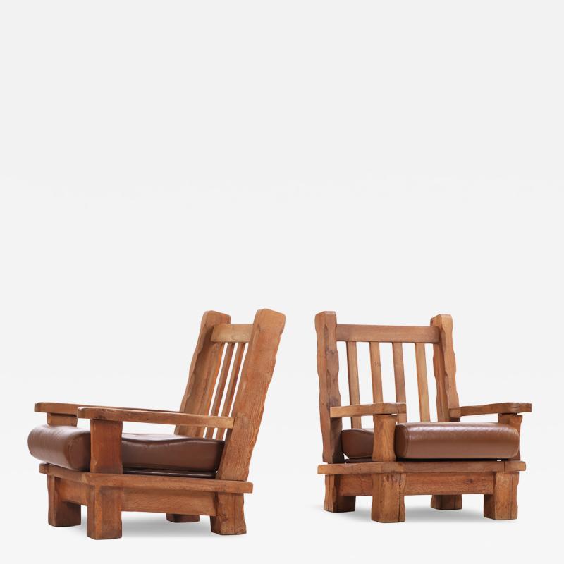 A Pair of French Brutalist style Oak Armchairs C 1960 