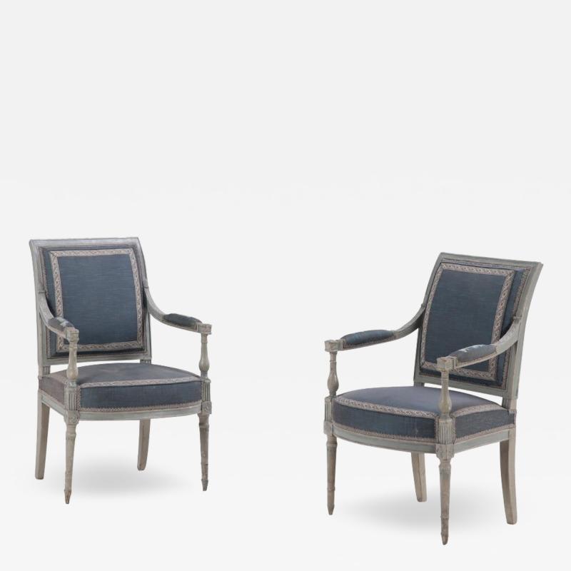 A Pair of French Directoire painted open armchairs C 1800 
