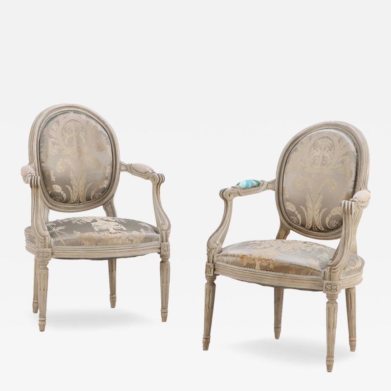 A Pair of French Louis XV style Painted Open Armchairs C 1940 