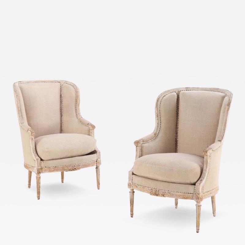 A Pair of French Louis XVI style upholstered and painted bergere chairs C 1900 