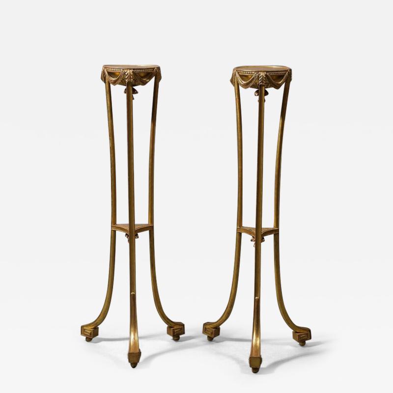 A Pair of George III Gilt Neoclassical Stands