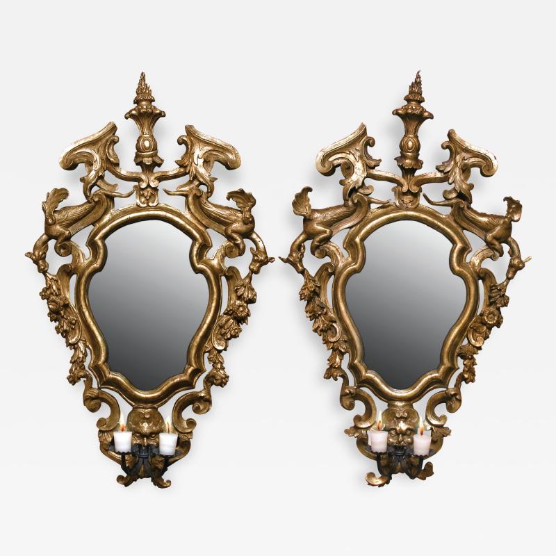 A Pair of Gilded Fir Wood Mirror Sconces with Wrought Iron Candle Arms