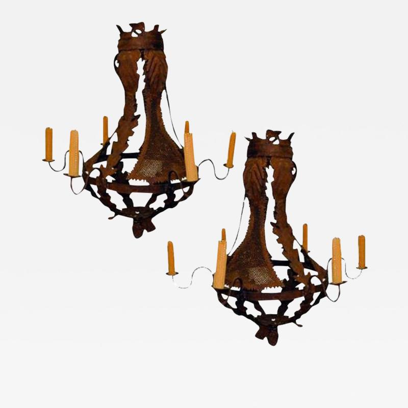 A Pair of Italian Baroque Six Light Iron Chandeliers