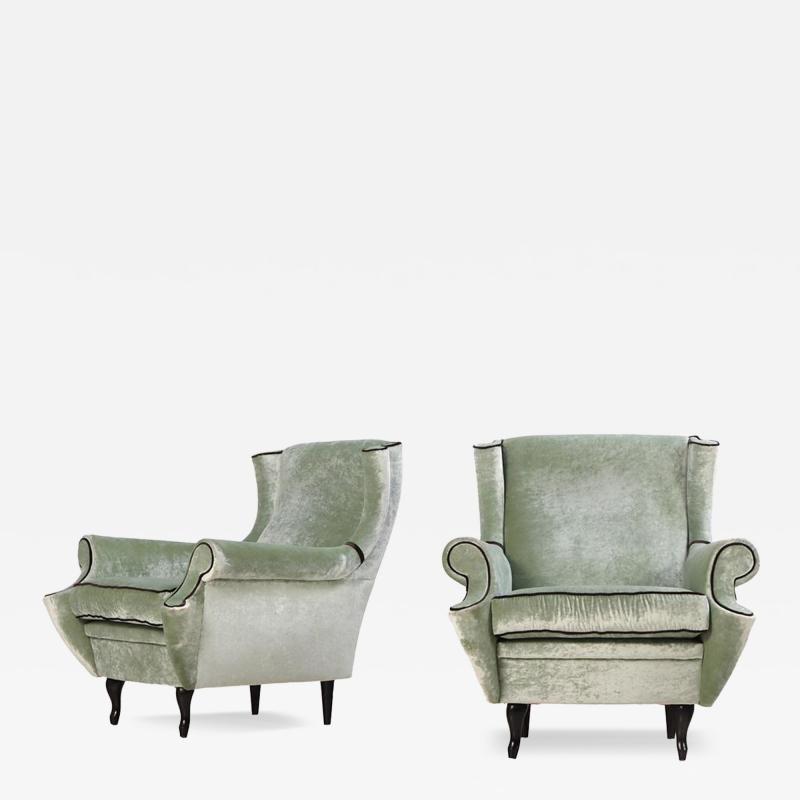 A Pair of Italian upholstered two tone lounge chairs C 1950 