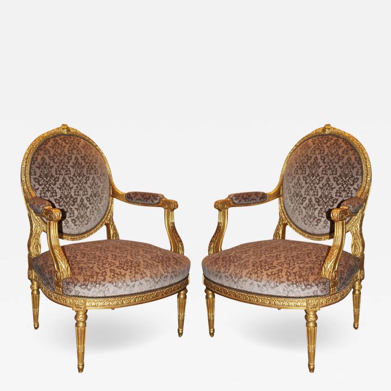 A Pair of Late 18th Century Italian Louis XVI Giltwood Marquise Armchairs