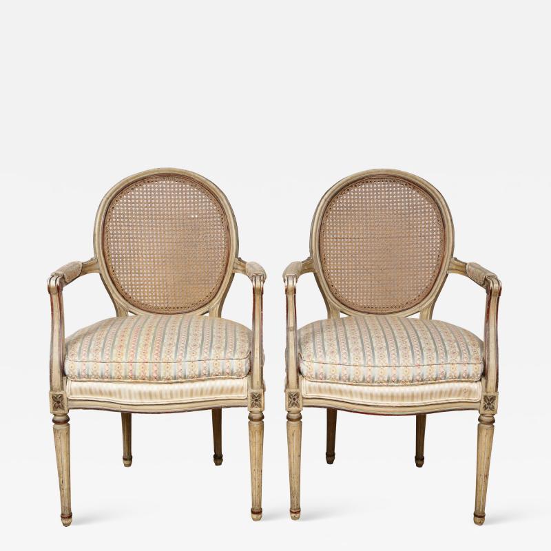 A Pair of Louis XVI Arm Chairs