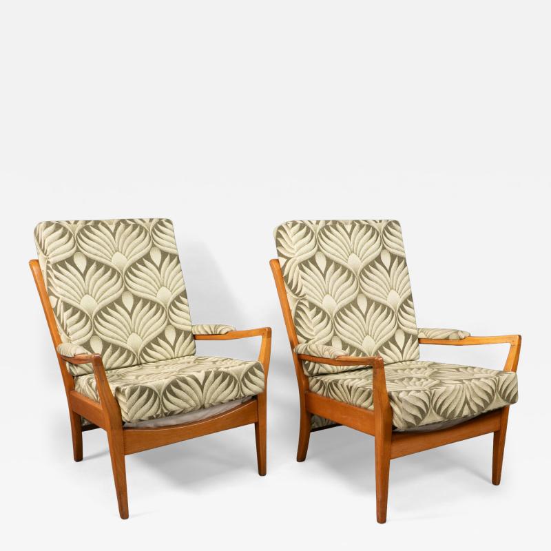 A Pair of Mid Century Beech Armchairs with Outswept Arms
