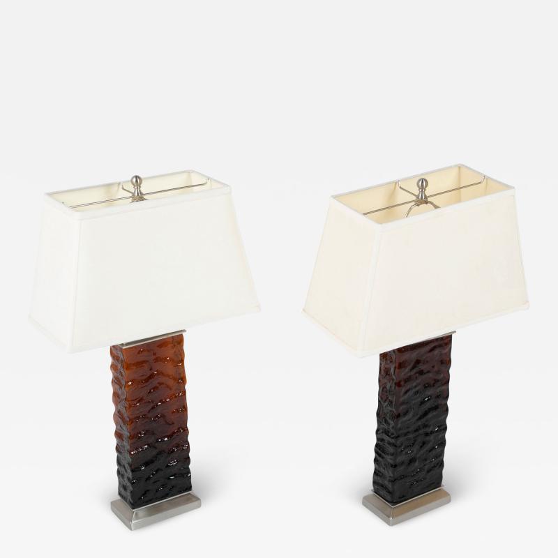 A Pair of Mid Century Wavy Amber Glass Steel Lamps