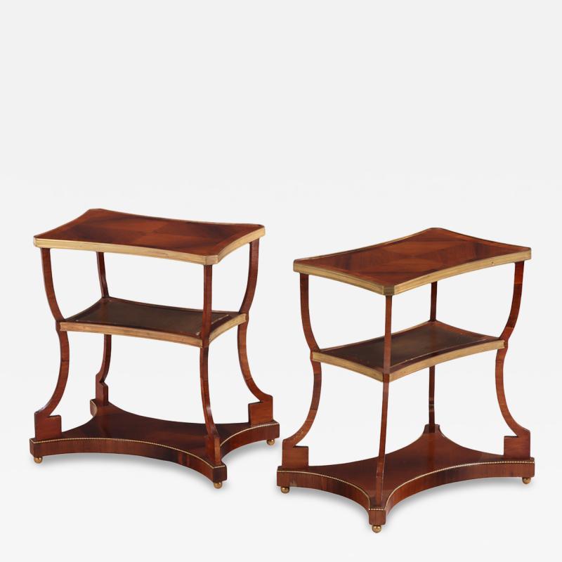A Pair of Regency style Rosewood Leather Bronze Mounted Three Tier End Tables 