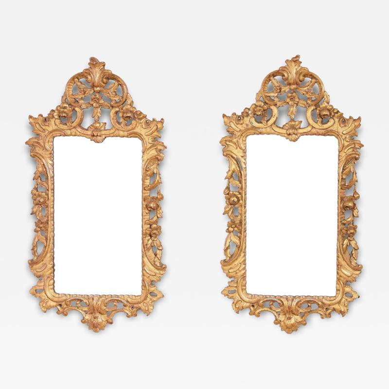 A Pair of Rococo Giltwood Mirrors