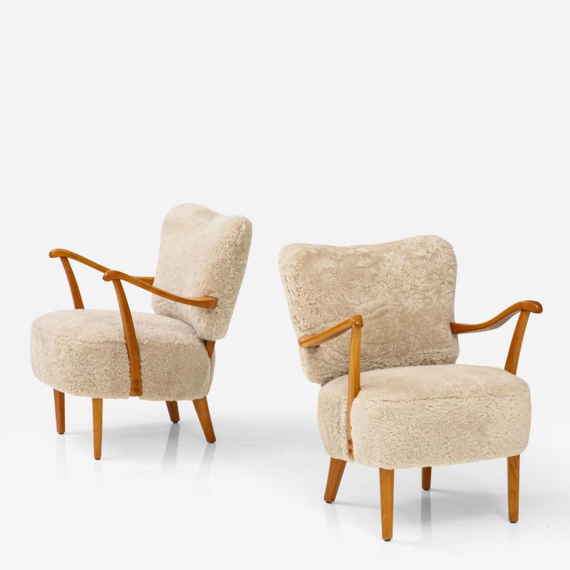 A Pair of Swedish Modern Sheepskin Upholstered Armchairs Circa 1940 50