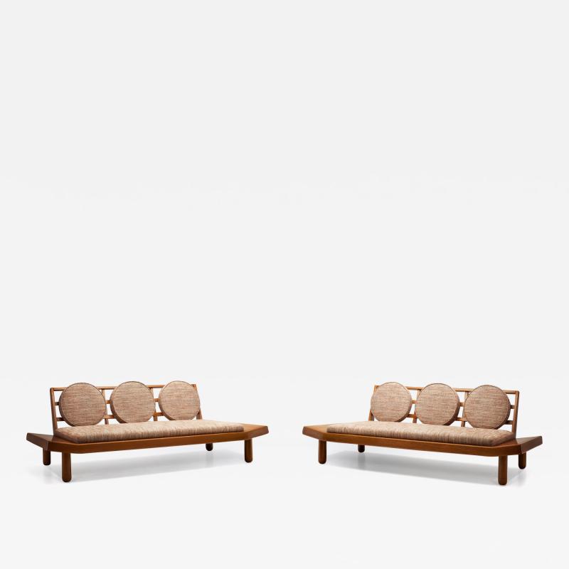 A Pair of Wooden Sofas with Round Cushions Indonesia 1960s