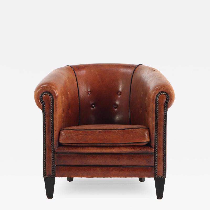 A Patinated Sheepskin Leather Club Chair C 1950 from Holland 