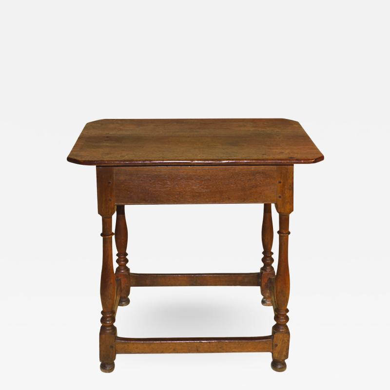 A Pennsylvania walnut stretcher base table