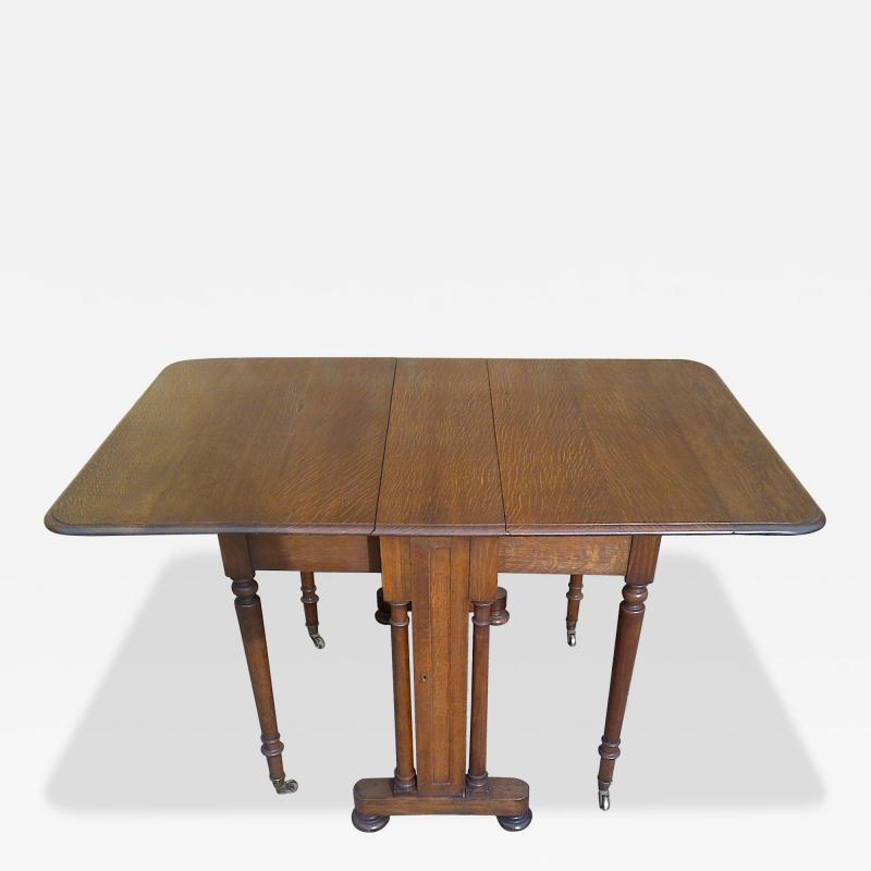 A Quality Drop Leaf Victorian Oak Dining Table