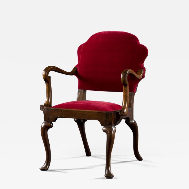 A RARE QUEEN ANNE WALNUT ARMCHAIR OF SMALL PROPORTIONS