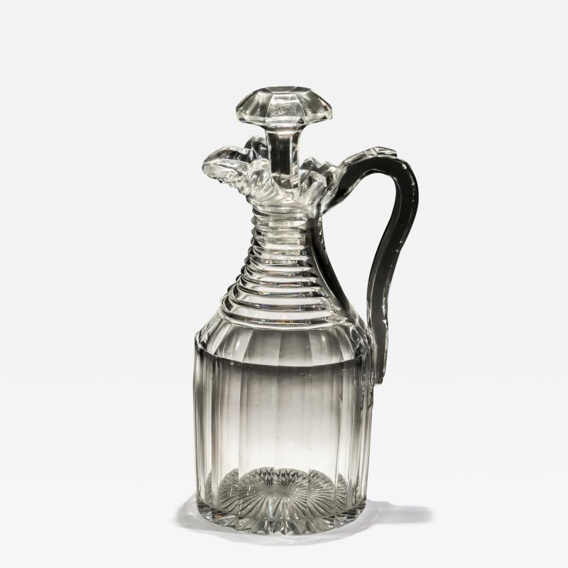 A REGENCY SLICE STEP CUT CLARET JUG