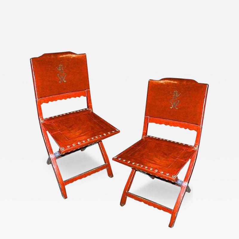 A Rare Pair of 19th Century Chinese Red Pigskin Folding Chairs