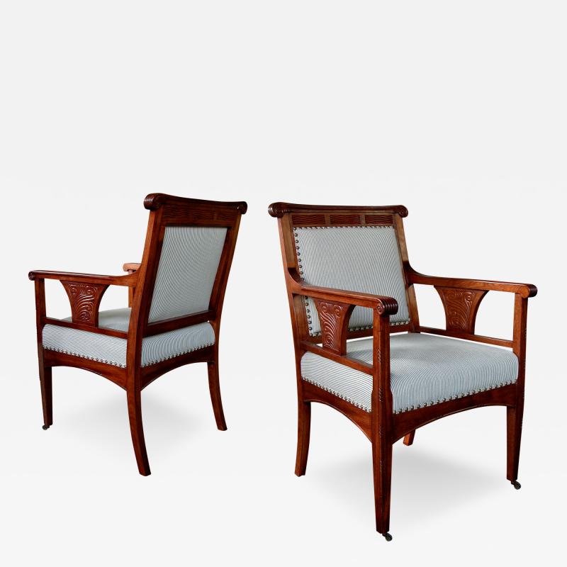 A Rare Pair of French Art Nouveau Carved Mahogany Armchairs