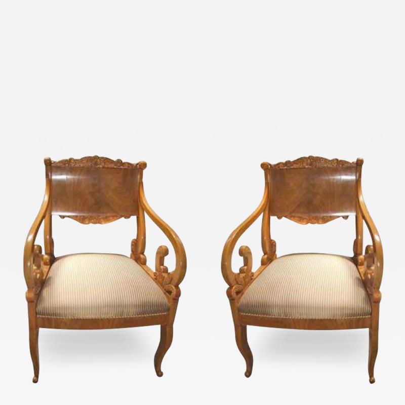 A Rare Pair of Intricately Carved 19th Century Russian Empire Chairs