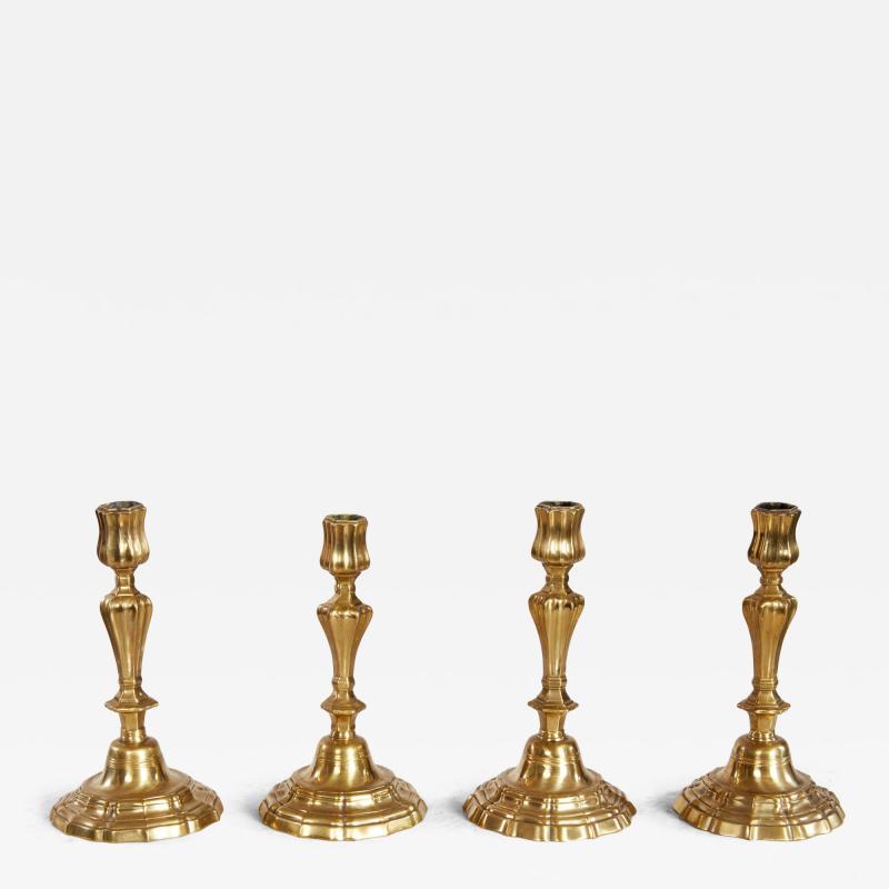 A Rare Set of Four Louis XIV Brass Candlesticks c 1690