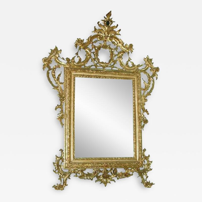 A Regal 18th Century Venetian Rococo Carved Gilt Mirror