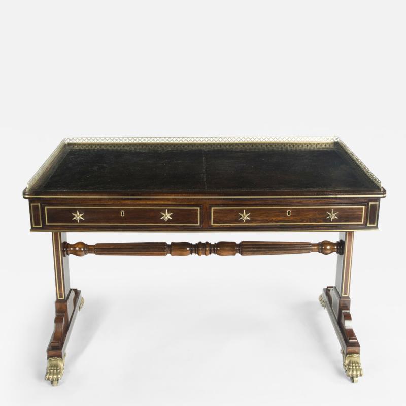 A Regency rosewood free standing end support writing table by Gillows