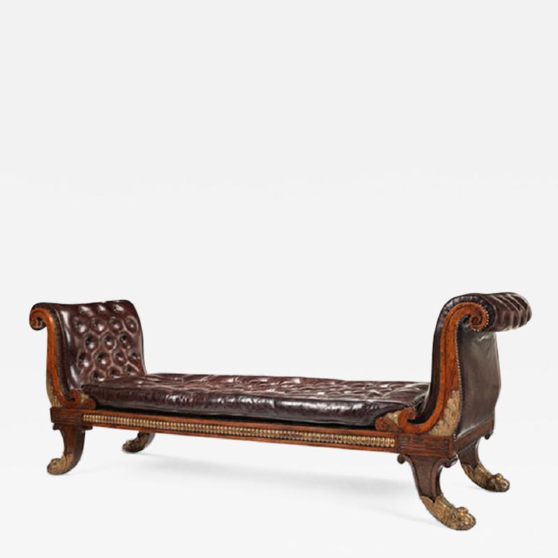 A Regency simulated rosewood and parcel gilt daybed