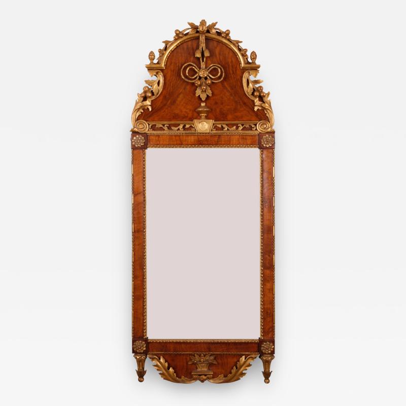 A Rococo Walnut and Parcel Gilt Mirror Danish Schleswig Holstein ca 1780