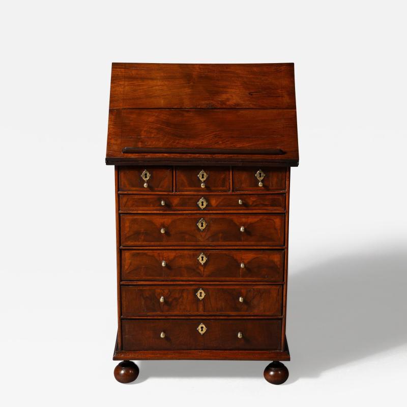 A Rosewood and Walnut William and Mary Ratcheted Bachelors Chest