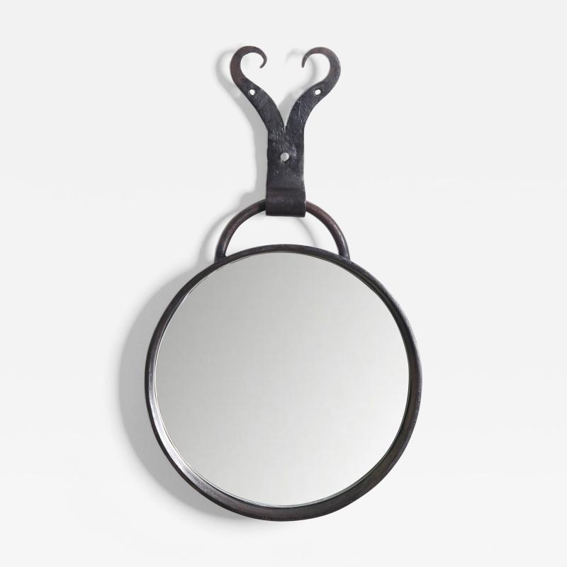 A Round Steel Mirror