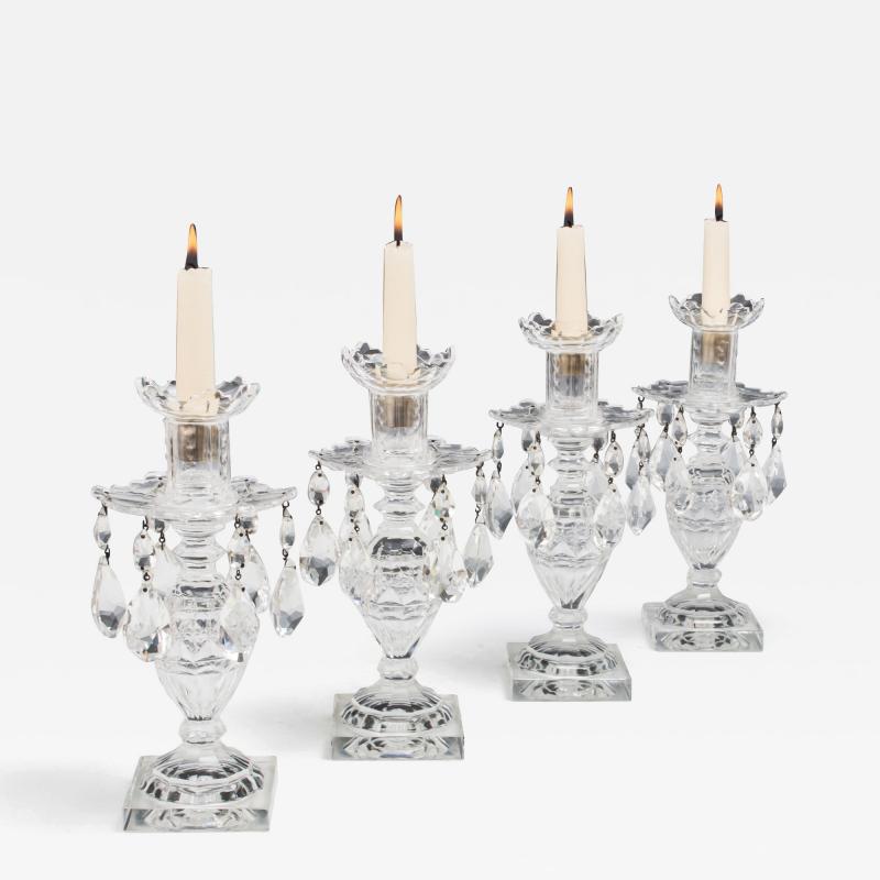 A SET OF FOUR CUT GLASS SLIPOVER CANDLESTICKS IN 18TH CENTURY STYLE