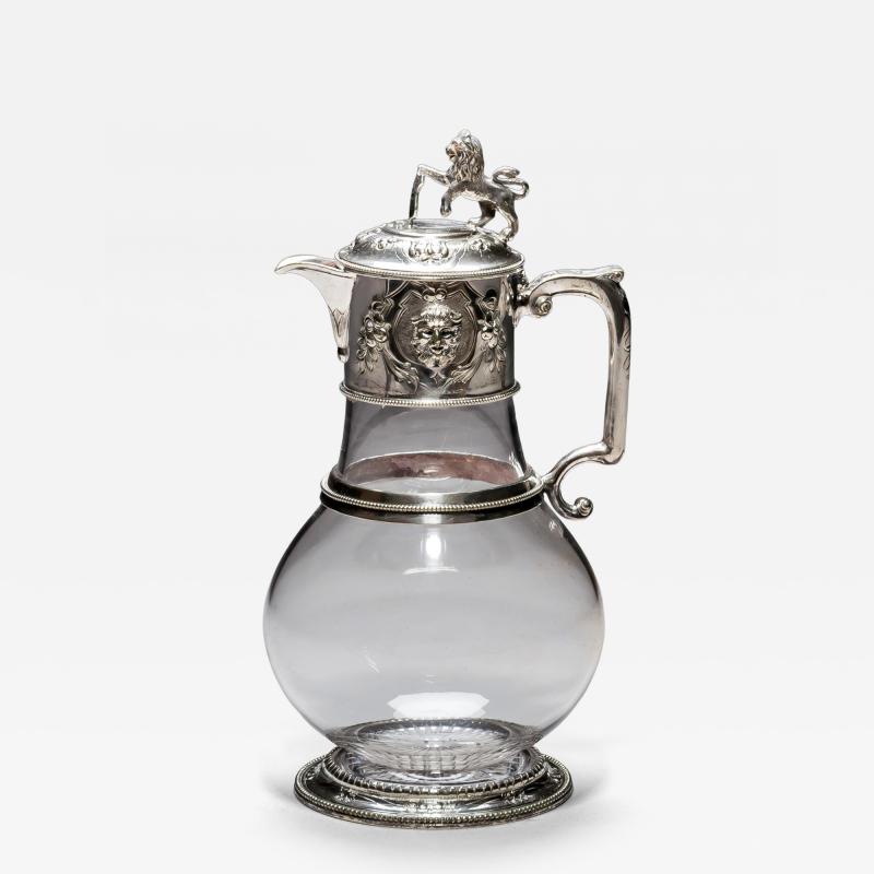A SILVER PLATED JUG COMMISSIONED FOR UNIVERSITY COLLAGE OXFORD