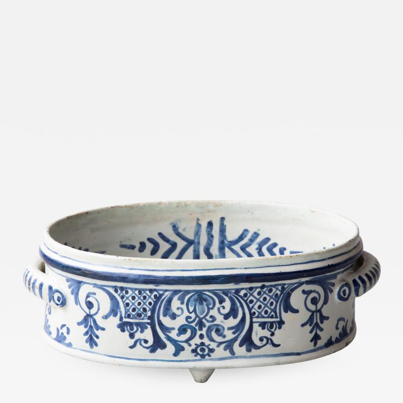 A SMALL FAIENCE TWO HANDLED BASSIN OR JARDINIERE