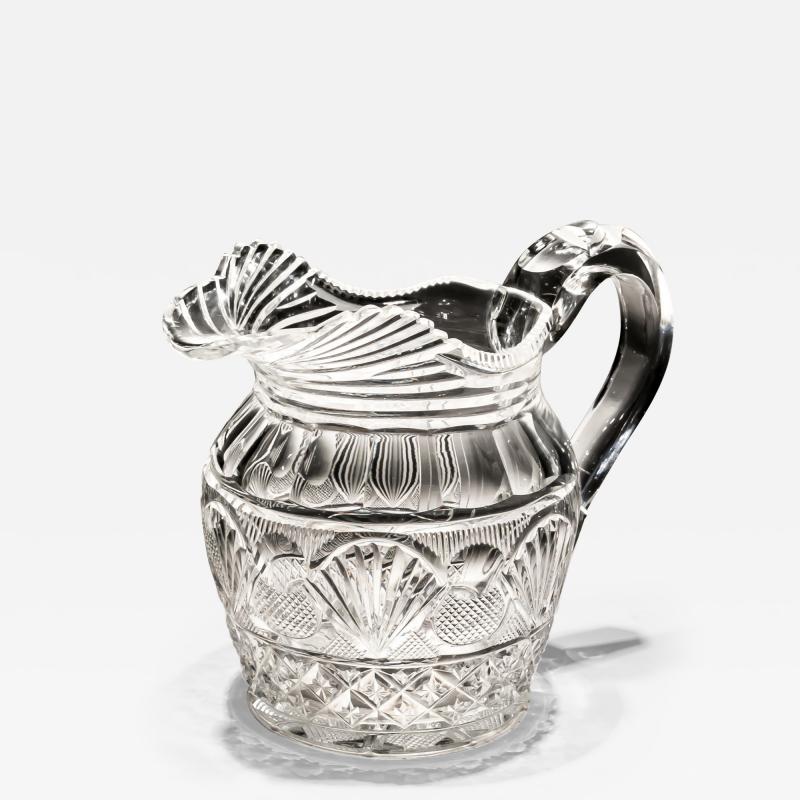 A SMALL REGENCY DIAMOND CUT JUG