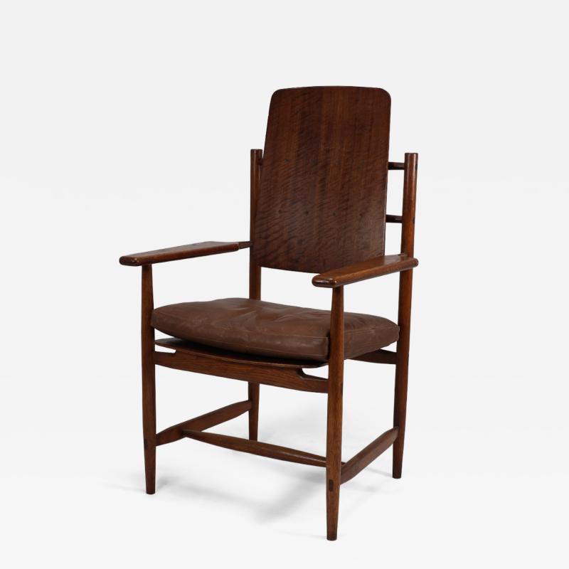 A Scandinavian Style Designer Solid Oak Armchair with a Laminated Back Seat