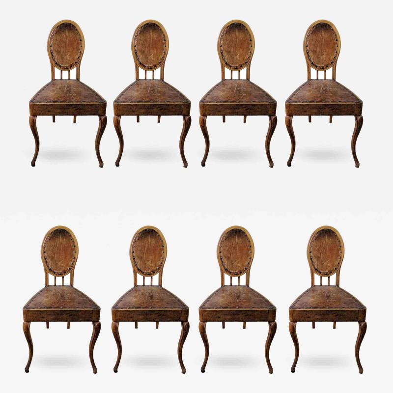 A Set of Eight French Leather and Oak Art Nouveau Chairs Circa 1910