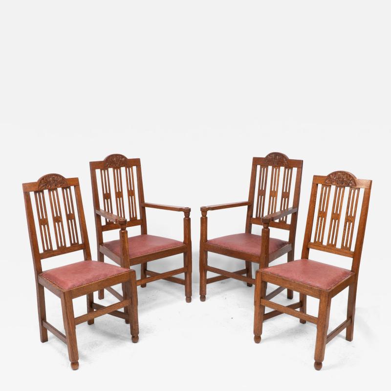 A Set of Four Arts Crafts Dining Chairs with Nicely Carved Floral Decoration