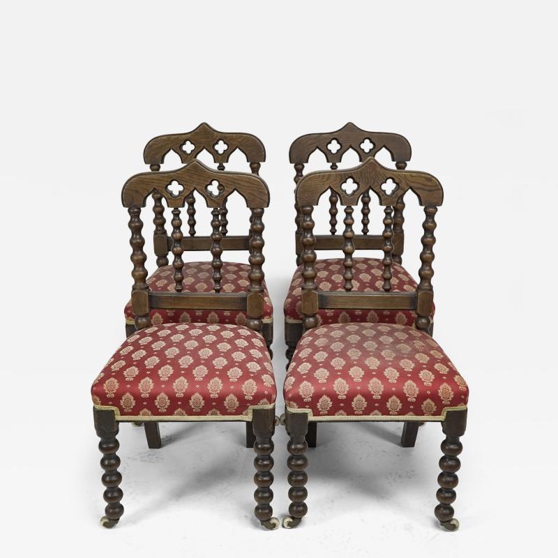 A Set of Four Gothic Revival Bobbin Turned Oak Dining Chairs