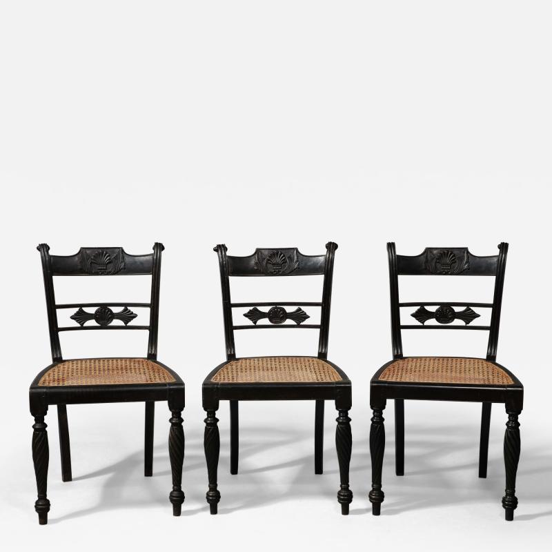 A Set of Three Ceylonese Solid Ebony Dining Chairs