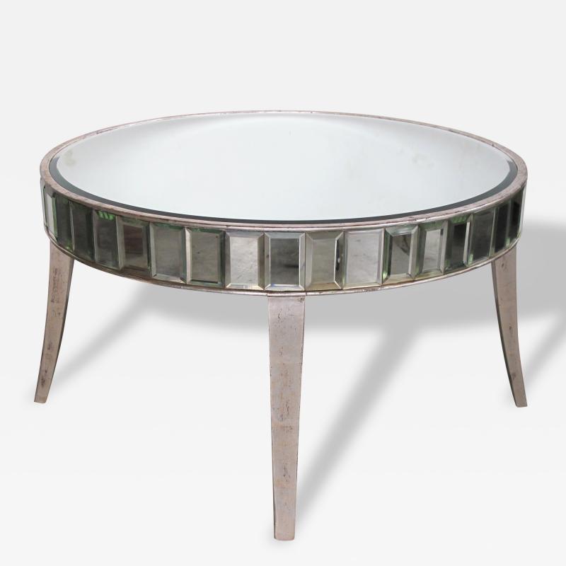 A Shimmering American Circular Cocktail Table with Silver Gilt Wood Supports