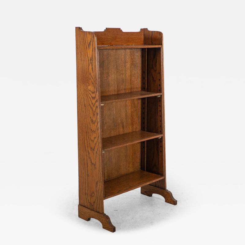 A Small Arts Crafts Oak Bookcase with Adjustable Shelves